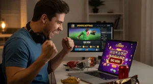 mega sports world live sports player celebrating win while using laptop casino buenas casino